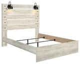 Cambeck Whitewash Queen Panel Bed close-up of headboard and sconce lights