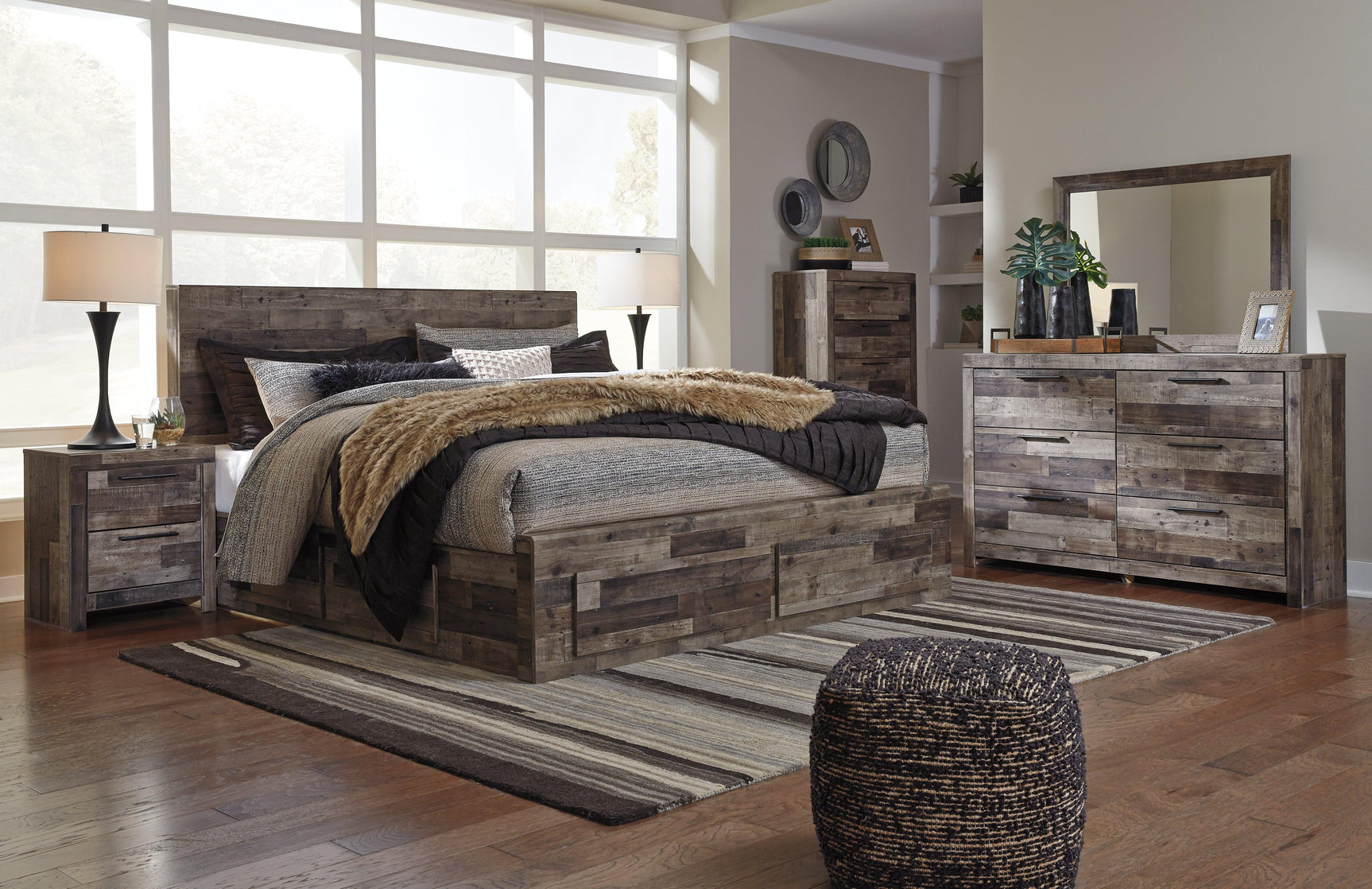 Rustic multi gray finish detail on Derekson King Panel Bed wood grain