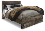 Close-up of rustic butcher block finish on Derekson bed footboard