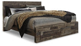 Side view of Derekson King Panel Bed showing rustic finish and drawer detail