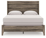 Elbrim Brown Queen Panel Bed footboard and side view