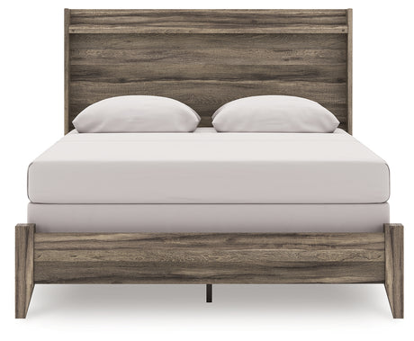 Elbrim Brown Queen Panel Bed footboard and side view