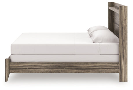 Side angle of Elbrim king panel bed showing flat panel design
