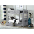 Orion Gray twin over twin bunk bed showcasing storage drawers under bottom bunk