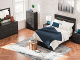 Lifestyle setting of Hollivern Dark Gray Queen Bed
