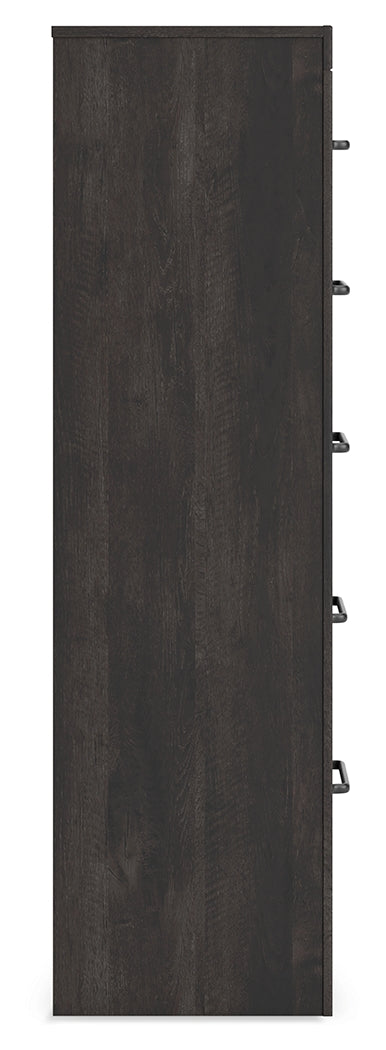 Side view of Hollivern chest of drawers
