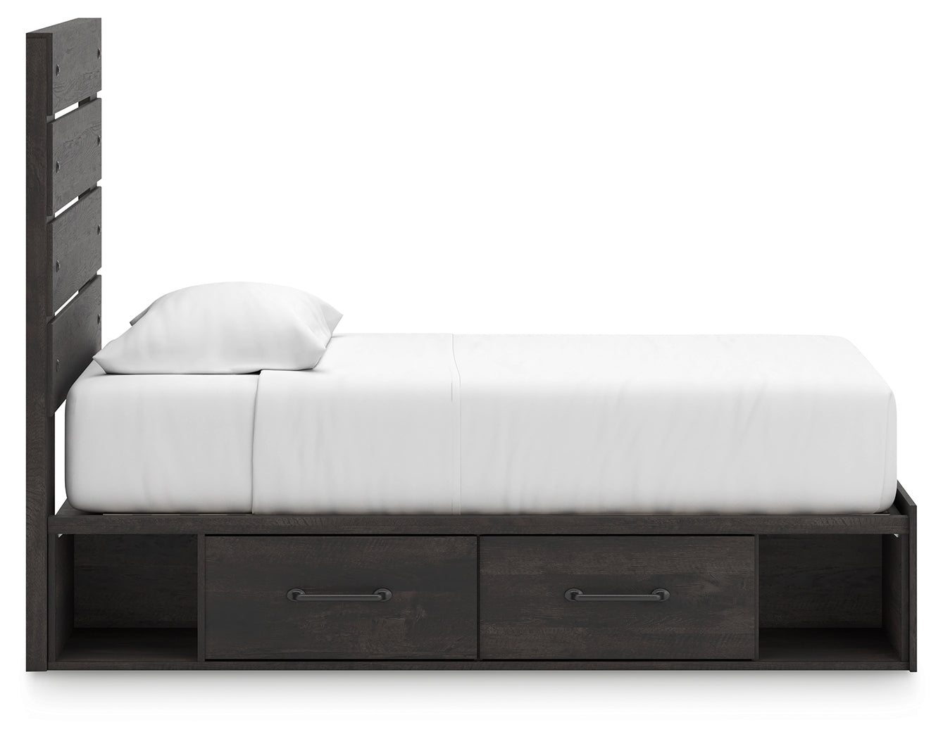 Bed fully assembled with bedding on Hollivern twin bed