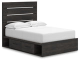 Side view of Hollivern full panel bed with drawers open