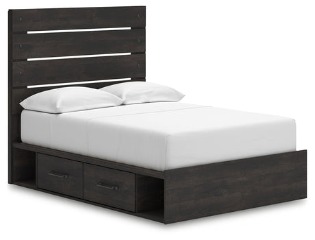 Side view of Hollivern full panel bed with drawers open