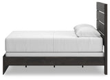 Hollivern Queen Panel Bed showing headboard texture