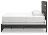 Hollivern Dark Gray King Panel Bed - headboard texture detail