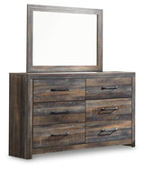 Close-up of dark-tone industrial metal drawer pulls on Drystan dresser