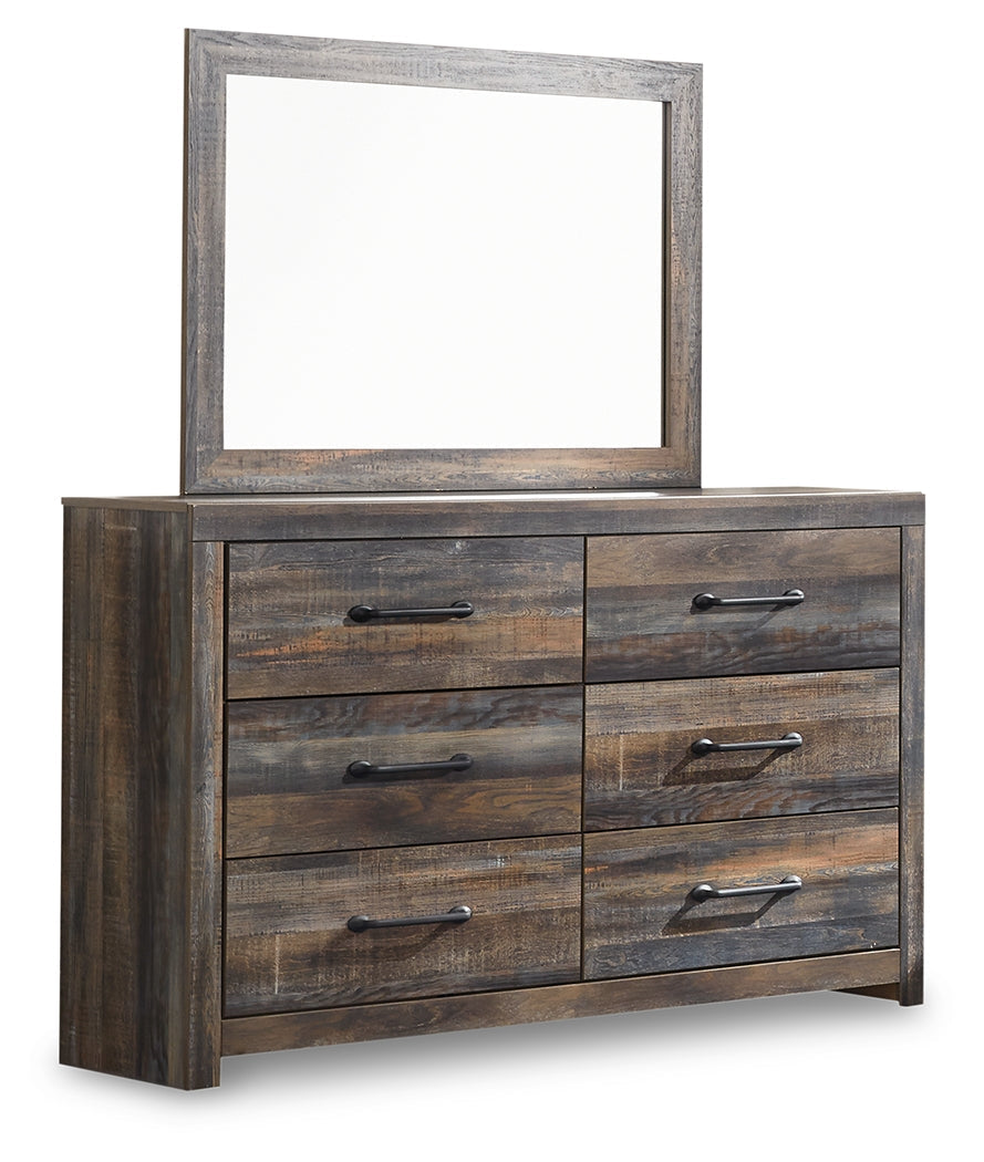 Close-up of dark-tone industrial metal drawer pulls on Drystan dresser