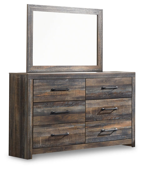 Close-up of dark-tone industrial metal drawer pulls on Drystan dresser