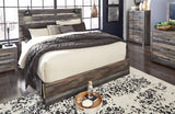 Close-up of Drystan bed headboard with sconce lights and USB ports
