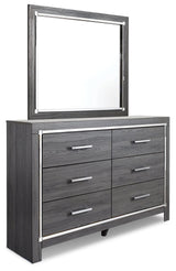 Close-up of chrome-tone drawer pull on Lodanna dresser