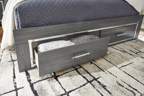 Gray finish with replicated wood grain visible on Lodanna King Panel Bed