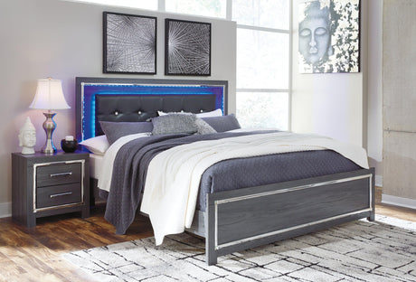 Close-up of Lodanna bed button-tufted faux leather headboard