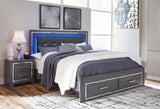 Side angle showing Lodanna King Panel Bed with two storage drawers open