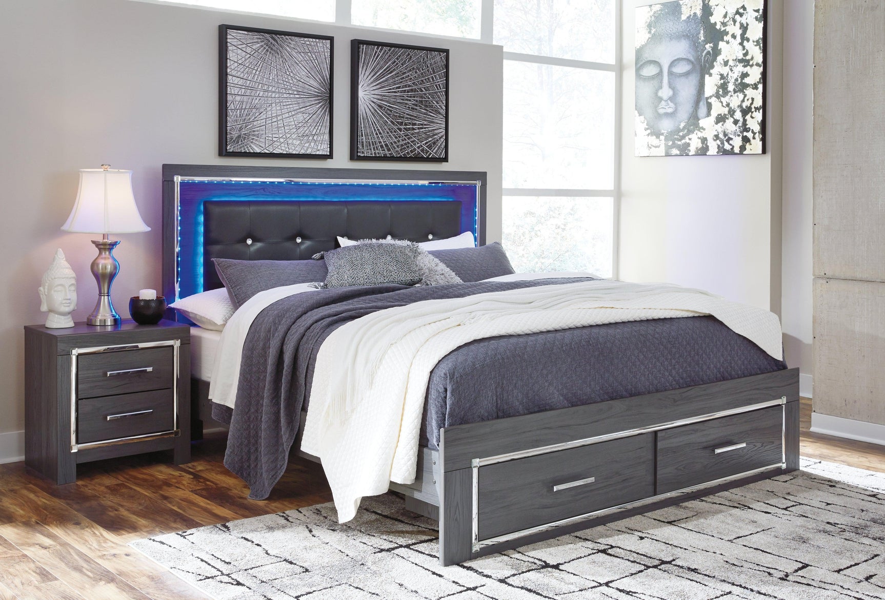 Side angle showing Lodanna King Panel Bed with two storage drawers open