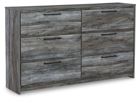 Baystorm mirror attached to dresser reflecting room