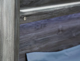 Baystorm Gray Full Panel Bed wood grain finish detail