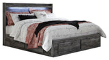 Baystorm gray king panel bed side view highlighting storage drawers
