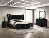 Side view of Armany Black Upholstered Wingback Panel Bedroom Set bed