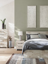 Lawroy queen panel storage bed in rustic white finish