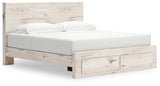 Storage drawers open on Lawroy king panel bed