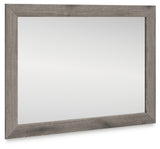 Graystorm bedroom mirror with weathered gray frame angled view