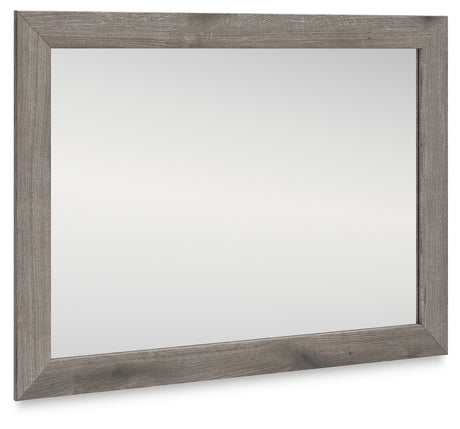 Graystorm bedroom mirror with weathered gray frame angled view