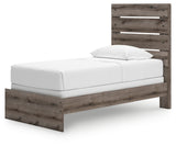 Side angle detail of Graystorm brown gray twin bed