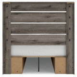 Side alternate angle of bed frame showcasing weathered brown gray finish