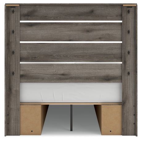 Side alternate angle of bed frame showcasing weathered brown gray finish