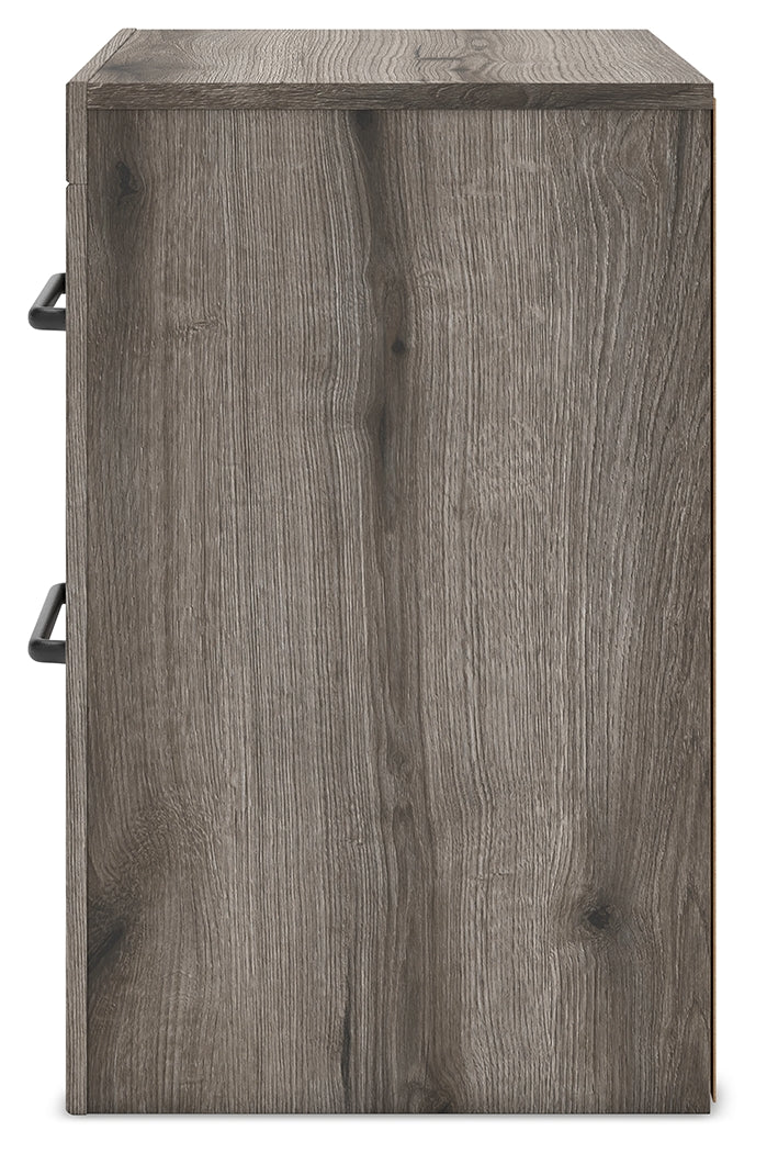 Nightstand top with USB ports visible