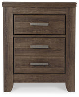 Side view of Juararo Dark Brown Nightstand showing drawer detail