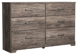 Ralinksi Gray Dresser angled closed drawers