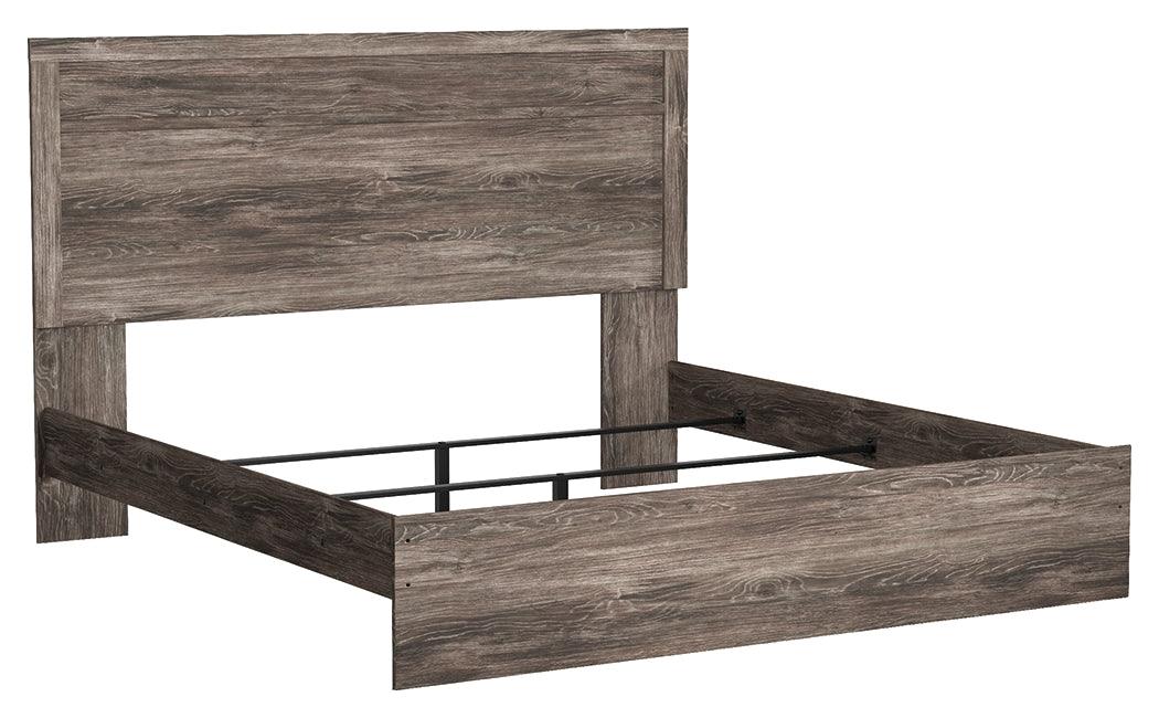 Ralinksi Gray King Panel Bed side view with headboard