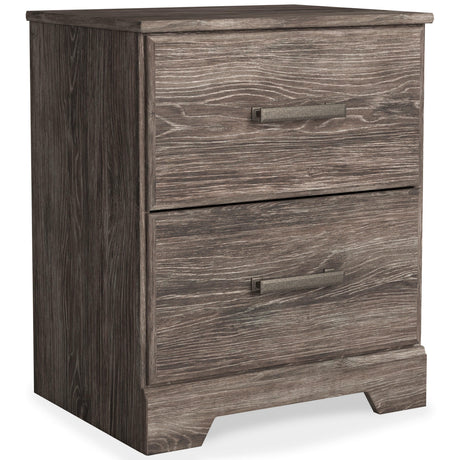 Ralinksi Gray Nightstand closed drawers side angle