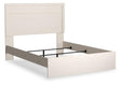 Stelsie White Queen Panel Bed angled view showing sleek white finish and panel headboard