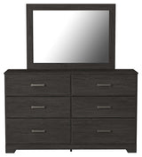 Head-on view of Belachime Black dresser and mirror set showing drawer fronts