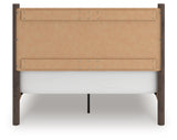 Back view of Pamytta Brown Queen Panel Bed showing finish