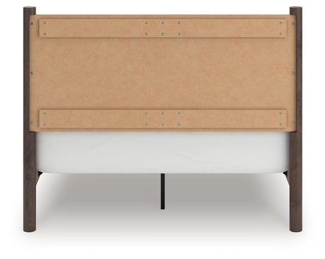 Back view of Pamytta Brown Queen Panel Bed showing finish