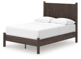 Close-up of reeded accents on brown bed frame
