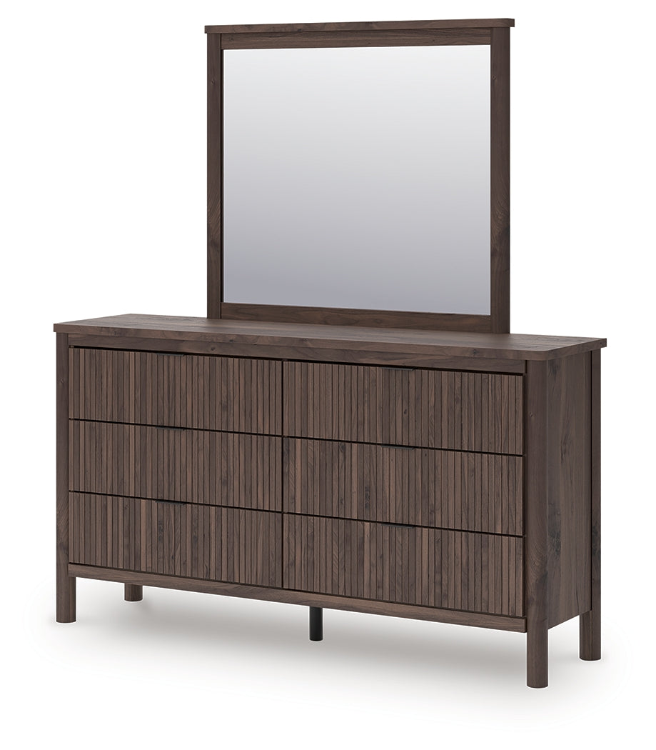 Close-up of black drawer pulls on Pamytta dresser