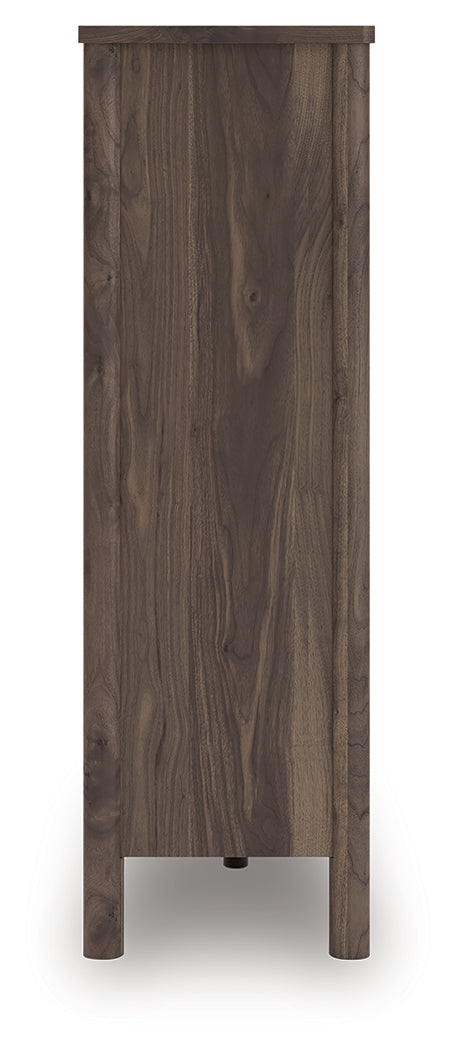 Side view of Pamytta brown wide chest of drawers