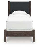 Pamytta Brown Twin Upholstered Panel Bed head-on view showing upholstered panel headboard