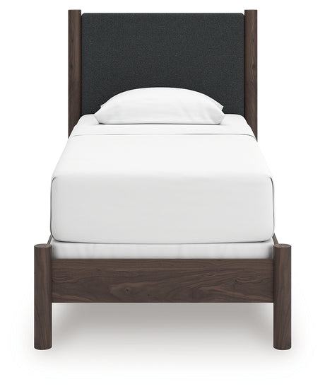 Pamytta Brown Twin Upholstered Panel Bed head-on view showing upholstered panel headboard
