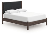 Upholstered headboard detail of Pamytta Brown Queen Bed